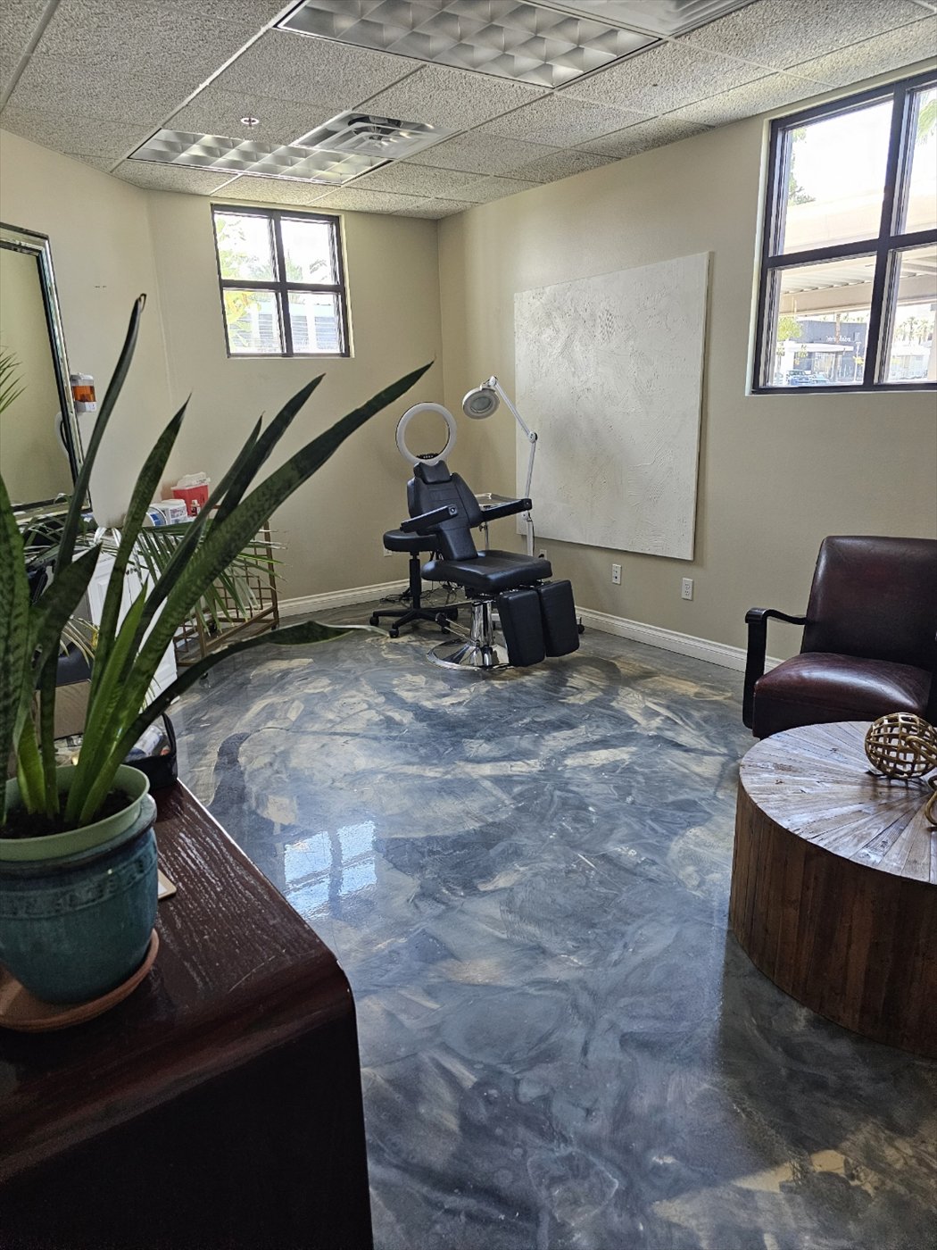 Medical spa treatment room with private natural light